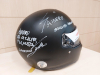 Casco firmado por el piloto (marca Bell Helmets)